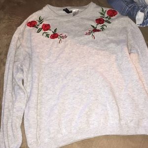 A long sleeve gray shirt